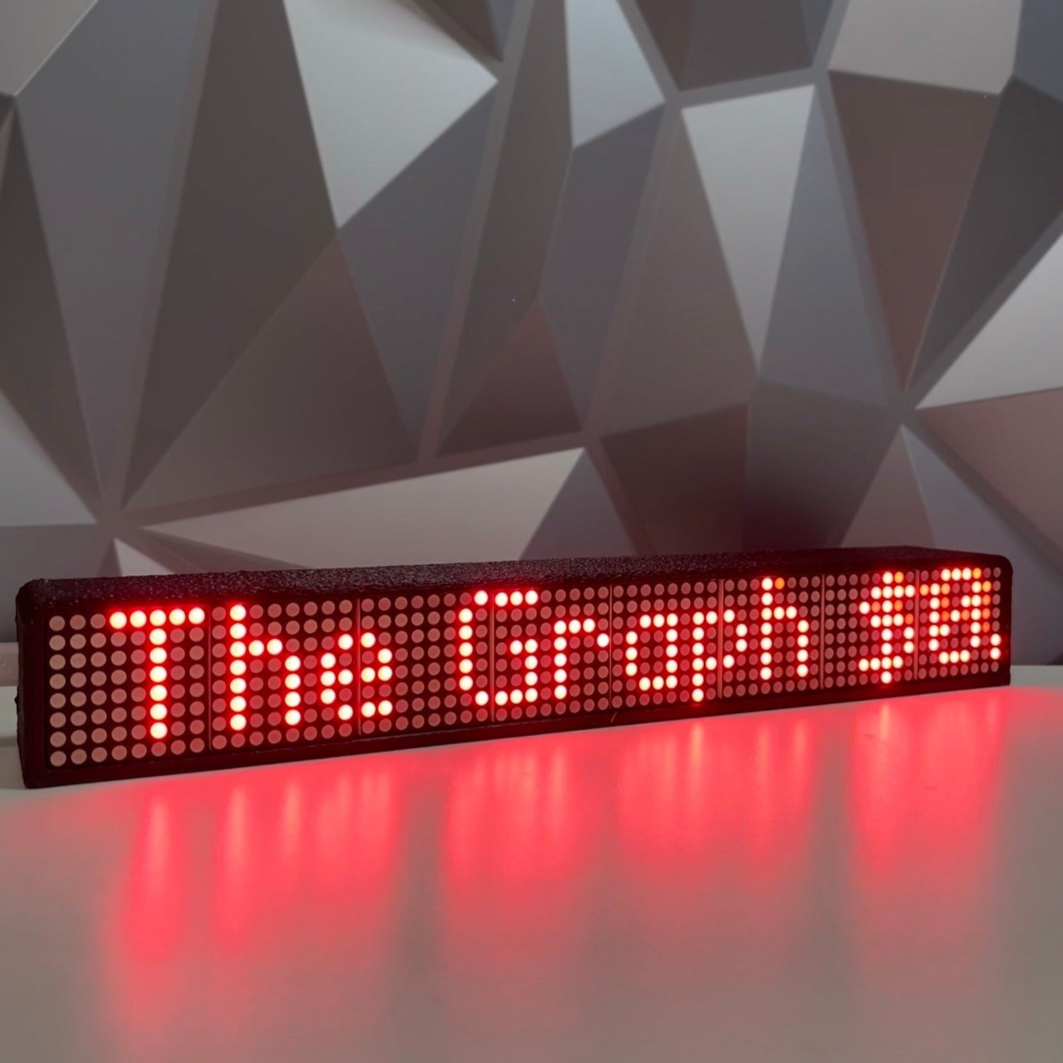 Red Matrix scrolling text crypto coin price display